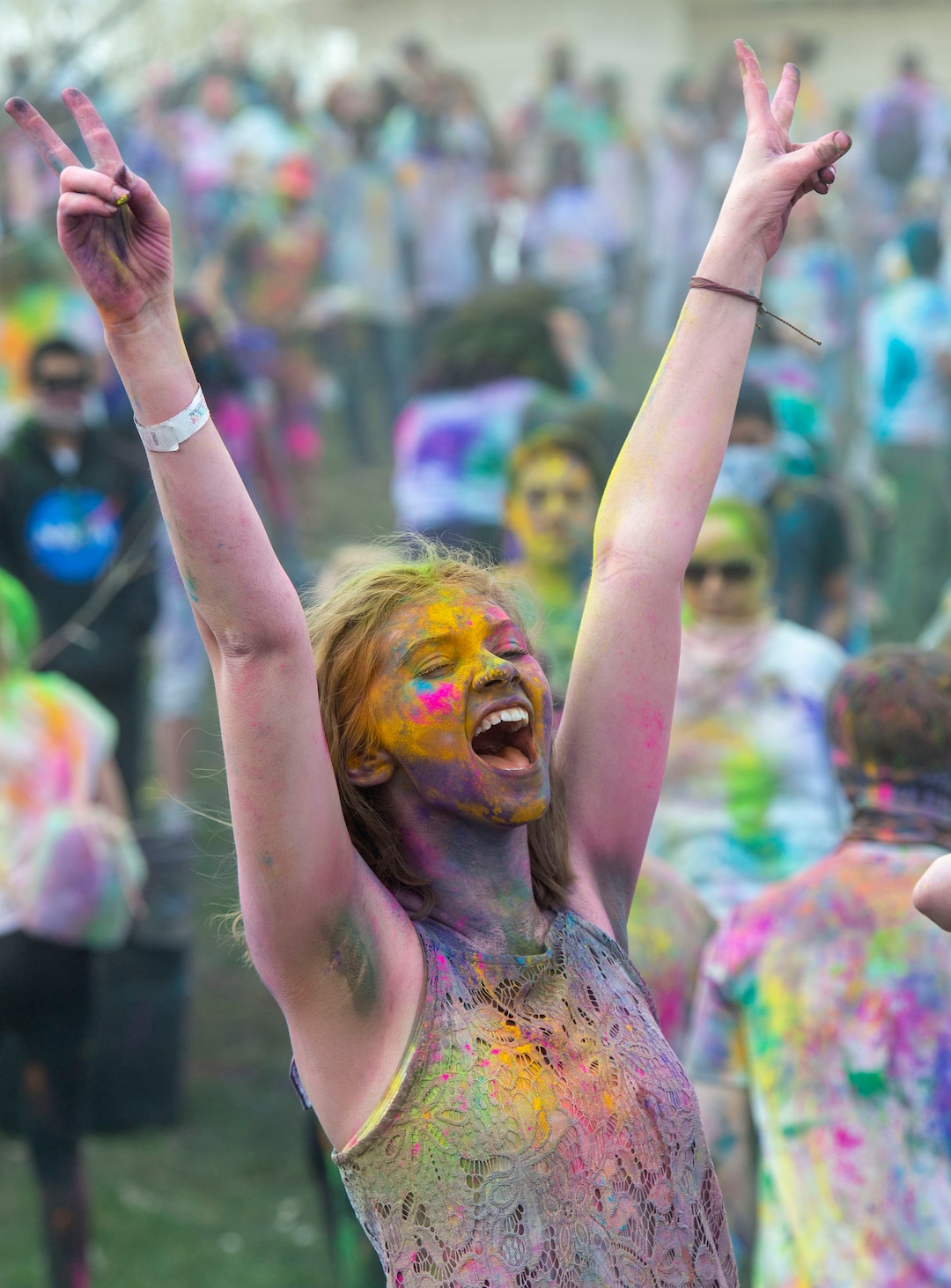 (Rick Egan  |  The Salt Lake Tribune)   Adalaide Bailey, from Pocatello Idaho cheers along with the band, during the Holi Festival of Colors celebration at the Sri Sri Radha Krishna Temple in Spanish Fork, Saturday, March 30, 2019. 