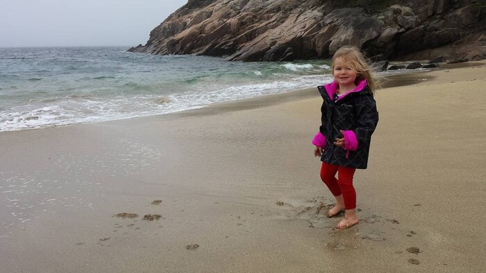 (Courtesy  |  Craig Buschmann) 

The author's daughter, Saskia, approaches the Atlantic Ocean on Sept. 29, 2015 from a beach at Acadia National Park.