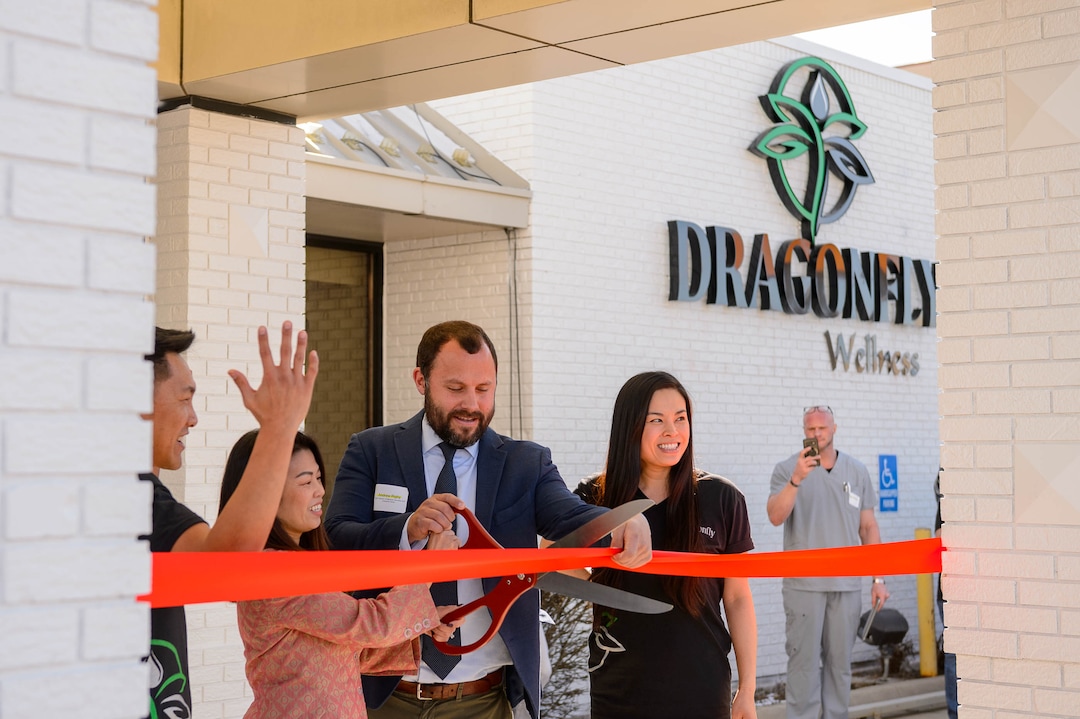 (Trent Nelson  |  The Salt Lake Tribune) Narith Panh, Hoang Nguyen, Andrew Rigby, and Lien Nguyen prepare to cut the ribbon as Dragonfly Wellness becomes the first of Utah's 14 medical cannabis pharmacies to open for business in Salt Lake City on Monday, March 2, 2020.