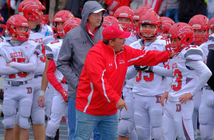 (Leah Hogsten  |  The Salt Lake Tribune) Delta's Jace Thomas gets some sideline instructions. Beaver High School boys' football team defeated Delta High School 35-16 during their class 2A state semifinal football game Saturday, November 4, 2017 at Weber State University's Stewart Stadium.