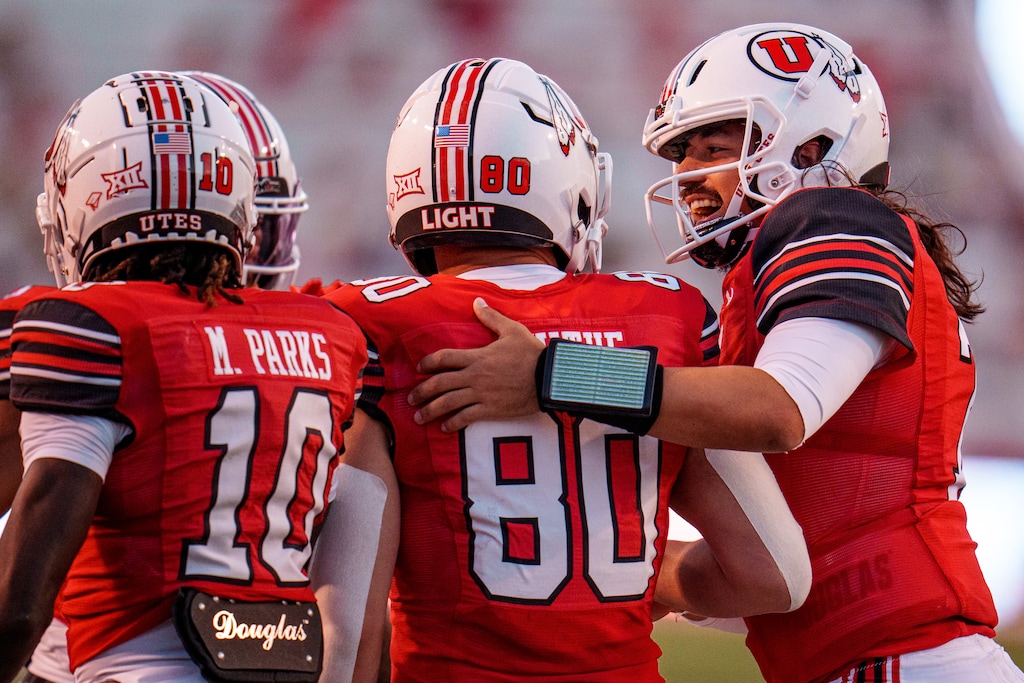 (Trent Nelson | The Salt Lake Tribune) Utah Utes tight end Brant Kuithe (80) and Utah Utes quarterback Cameron Rising (7) celebrate a touchdown as the Utah Utes host the Southern Utah Thunderbirds, NCAA football in Salt Lake City on Thursday, Aug. 29, 2024.