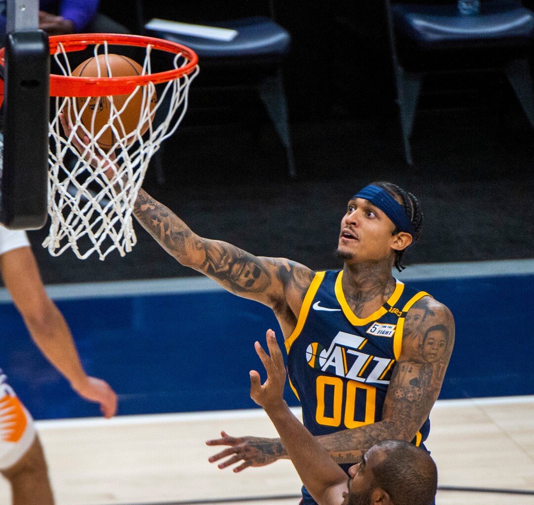 (Rick Egan | The Salt Lake Tribune) Utah guard Jordan Clarkson (00) scores for the Jazz, in NBA action between the Utah Jazz and the Phoenix Suns, on Thursday, Dec. 31, 2020.