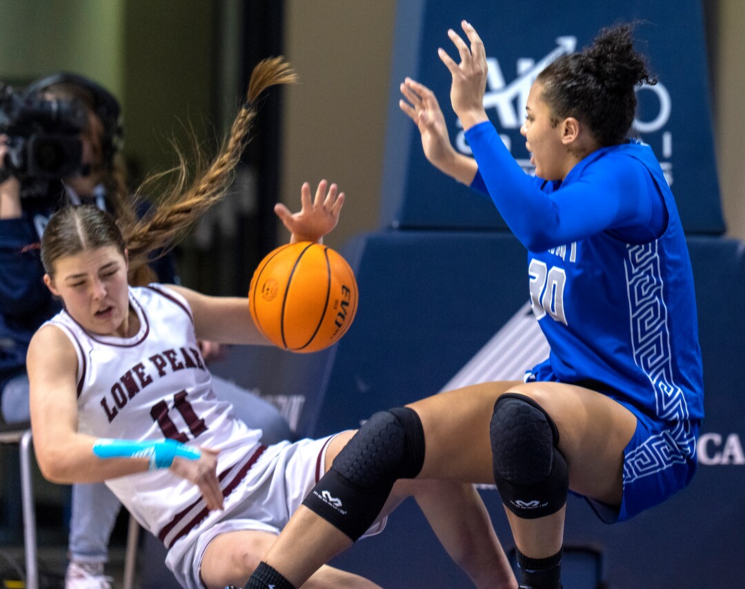 (Rick Egan | The Salt Lake Tribune) Lone Peak's Kailey Woolston(11) collides with Fremont forward, Timea Gardiner (30), in the 6A State Championship game between Fremont and Lone Peak, at the Marriott Center in Provo, on Saturday, March 5, 2022. 