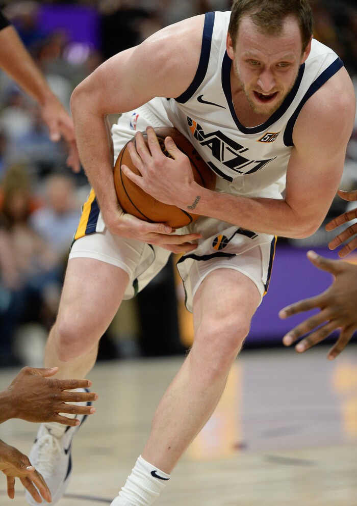 (Francisco Kjolseth  |  The Salt Lake Tribune)  Utah Jazz forward Joe Ingles (2) tries to push past the Raptors in the first half of the preseason NBA game at Vivint Smart Home Arena Tuesday, Oct. 2, 2018, in Salt Lake City.