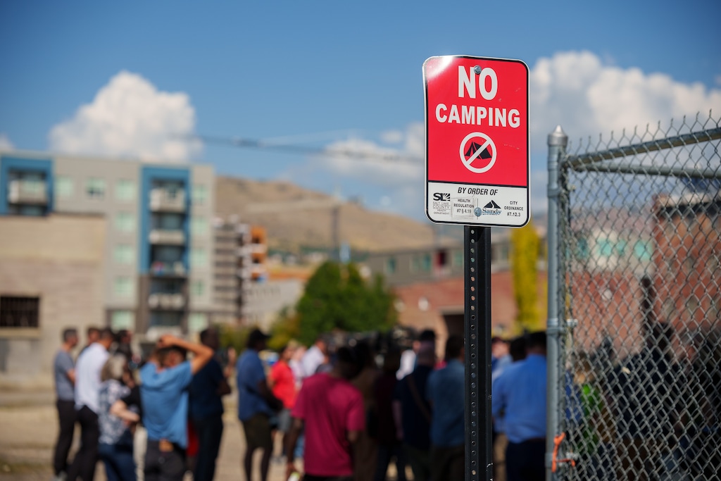 (Trent Nelson  |  The Salt Lake Tribune) A no camping sign as the site of a future legal homeless camp is announced in Salt Lake City on Thursday, Sept. 14, 2023.