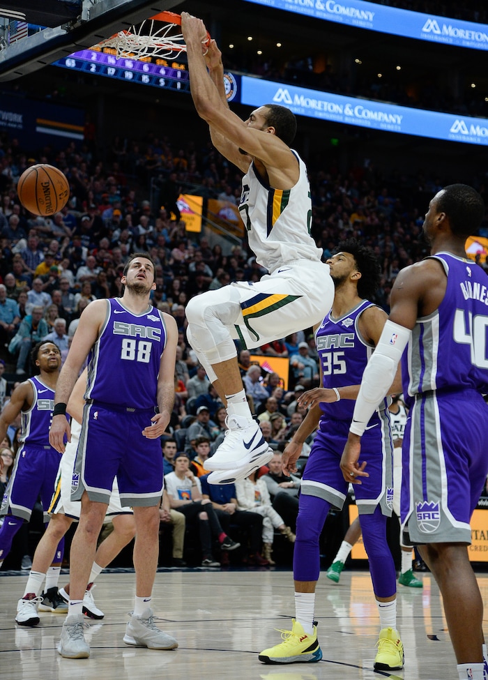 (Francisco Kjolseth  |  The Salt Lake Tribune)  Utah Jazz center Rudy Gobert (27) dunks the ball as the Utah Jazz host the Sacramento Kings in their NBA game at Vivint Smart Home Arena Friday, April 5, 2019, in Salt Lake City.