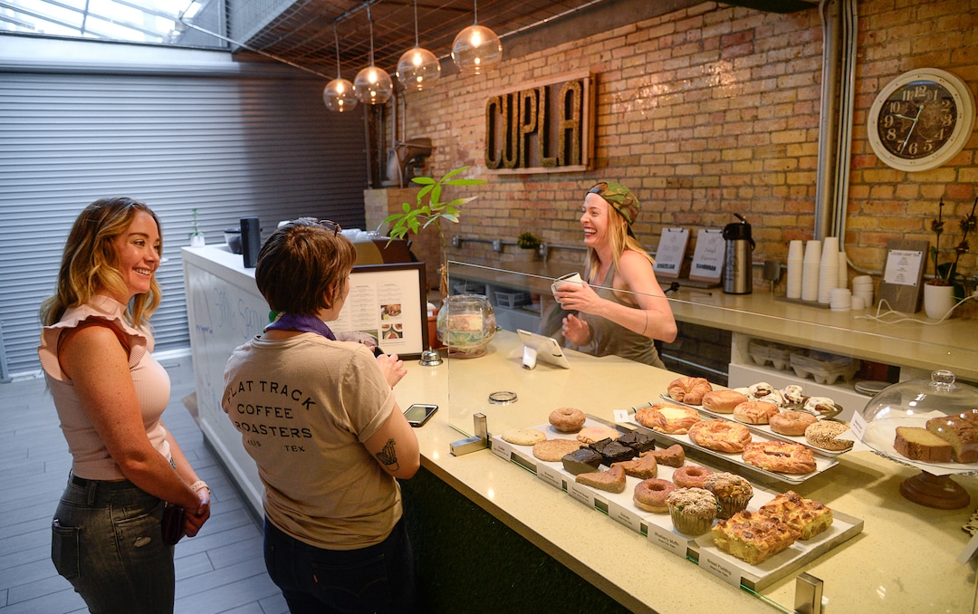 (Francisco Kjolseth  |  The Salt Lake Tribune)  Cupla Coffee opened about a year ago in the basement of the Axis Business Building across from the Salt Palace Convention Center. It's owned and operated by twin sisters Abby Purdie & Bethany Heath, pictured. They roast the coffee beans (at a separate location) and make all the baked items, catering to people with gluten-free, vegan, keto diets.