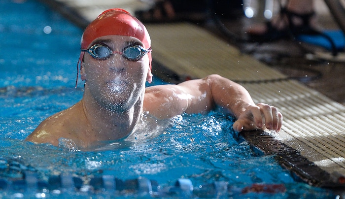 (Francisco Kjolseth | The Salt Lake Tribune) Nathan Van Buren of East looks at his time after competing in the Men 200 Yard IM at the high school swimming 5A State Championships in Bountiful, Friday February 9, 2018.