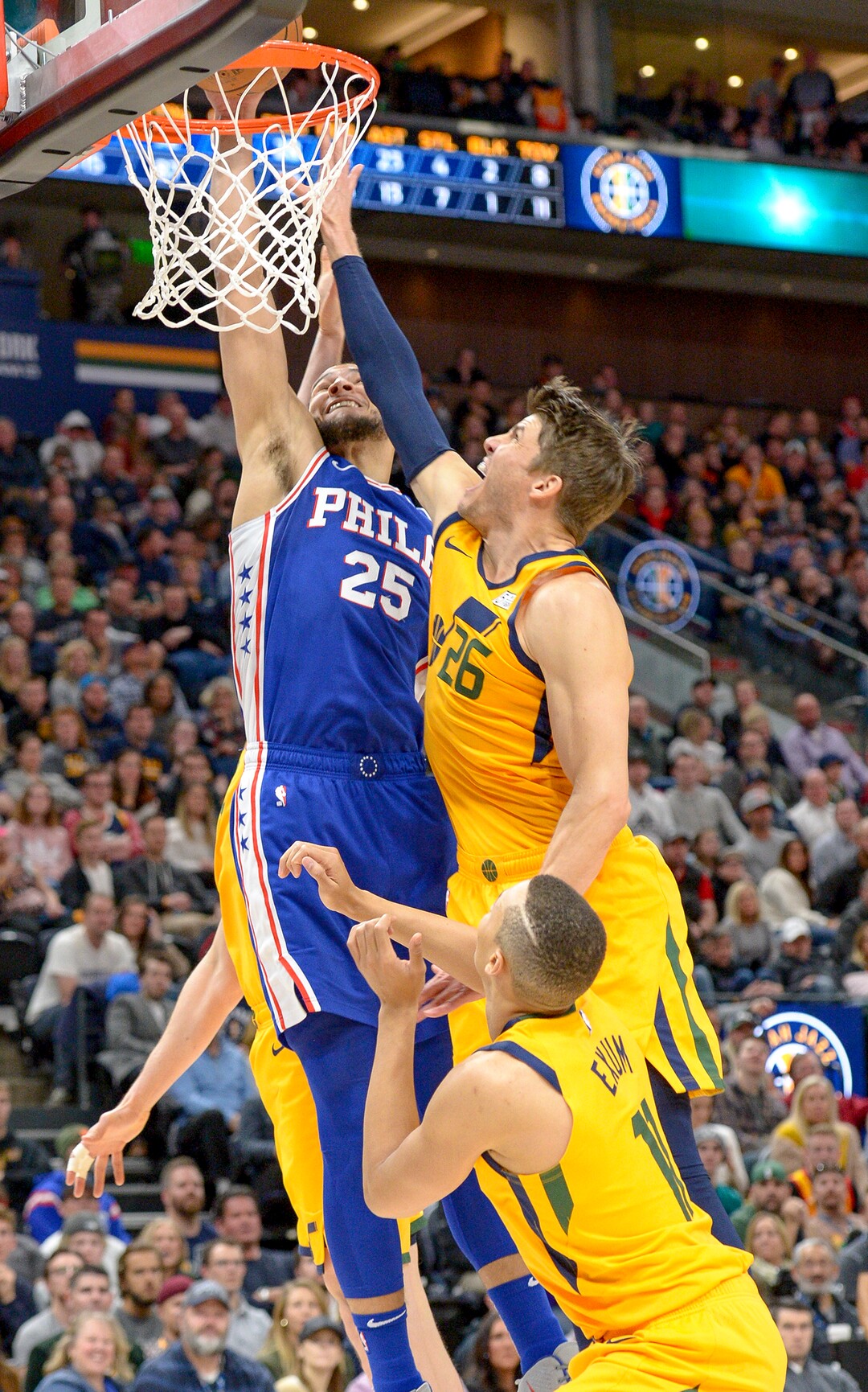 Leah Hogsten  |  The Salt Lake Tribune  Philadelphia 76ers guard Ben Simmons (25) battles Utah Jazz guard Kyle Korver (26) at the net. The Philadelphia 76ers defeated the Utah Jazz 114- 97 at Vivint Smart Home Arena, Thursday, December 27, 2018. 