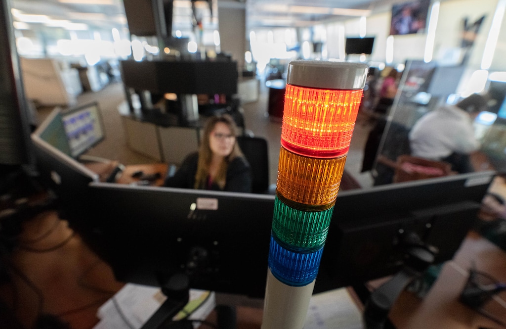 (Francisco Kjolseth | The Salt Lake Tribune) A red light indicates an active call for Salt Lake City's 911 operations inside the Public Safety Building. The department is exploring using artificial intelligence software to handle some nonemergency calls.