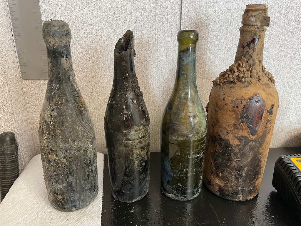 (Photo courtesy of Utah Transit Authority) Examples of artifacts found in a buried trash pile at the construction site of a new UTA facility offer a glimpse into what 19th century railroads used.