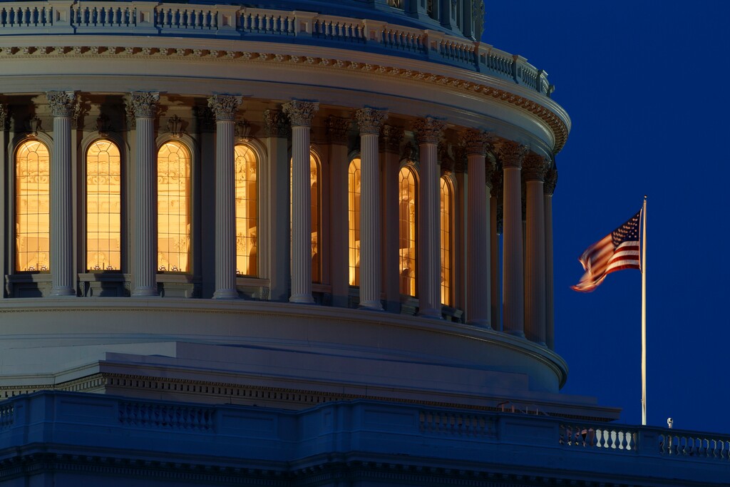 (Carolyn Kaster | AP file photo) An American flag flies on the Capitol Dome in Washington.
