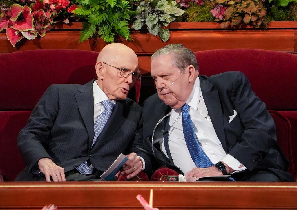 (Chris Samuels | The Salt Lake Tribune) Dallin H. Oaks, left, president of the Quorum of the Twelve Apostles, and apostle Jeffrey R. Holland converse during a session of General Conference of The Church of Jesus Christ of Latter-day Saints at the Conference Center in Salt Lake City, Sunday, Oct. 5, 2025.