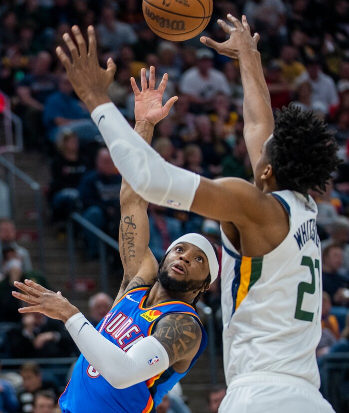 (Rick Egan | The Salt Lake Tribune) Oklahoma City Thunder guard Zavier Simpson (9) shoots as Utah Jazz center Hassan Whiteside (21), in NBA action between the Utah Jazz and the Oklahoma City Thunder at Vivint Arena, on Wednesday, April 6, 2022.
