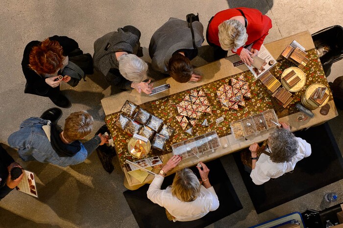 (Trent Nelson | The Salt Lake Tribune)
The 2018 Chocolate & Cheese Festival at the Natural History Museum of Utah in Salt Lake City, Sunday March 25, 2018. Lori Darr and Bobbie Wolbach hand out samples of toffee from Darr's Cache Toffee Collection.