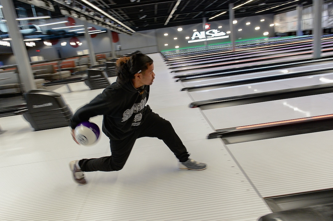 (Francisco Kjolseth  |  The Salt Lake Tribune)  Mathew Ailua let's it rip at All Star Bowling which opened a new 70,000 square foot, high-tech bowling and entertainment center at Valley Fair Mall, in West Valley City. It has 32 lanes with luxury seating, laser tag and virtual reality games as well as old-school air hockey, basketball and bumper cars. Inside the center is the new Pins & Ales 21+ bar with more games including axe throwing.