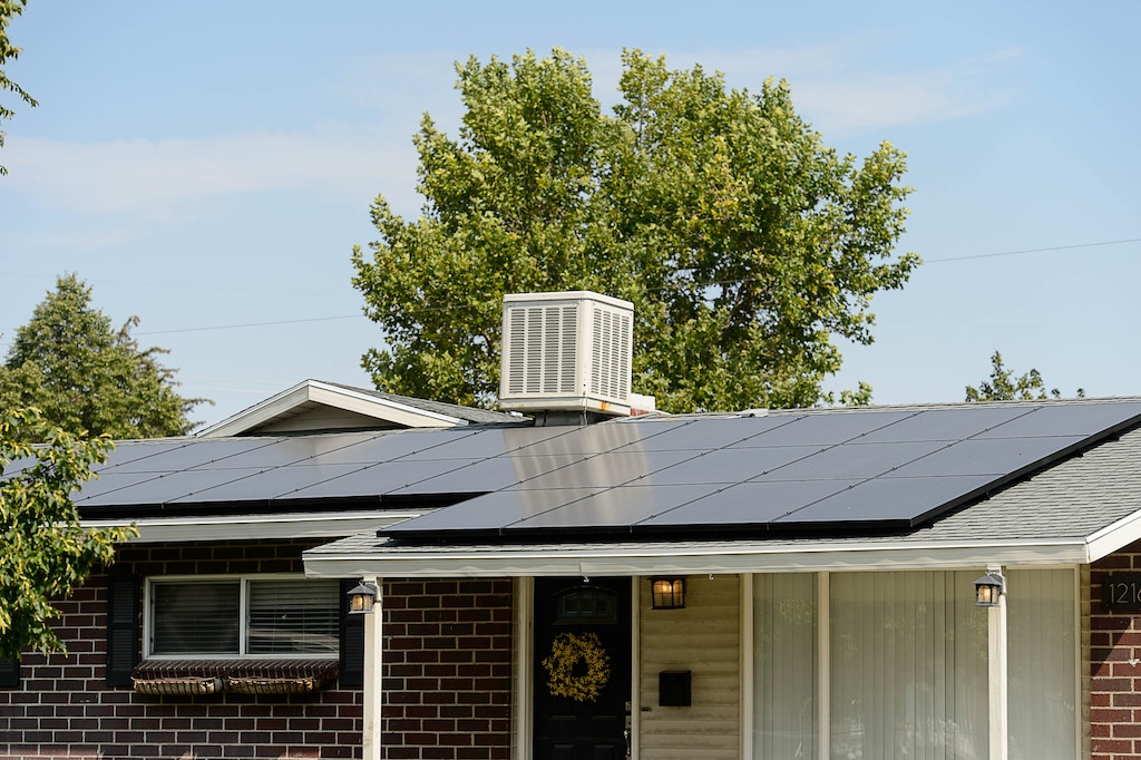 (Trent Nelson  | Tribune file photo)  Solar panels on a Rose Park home, Friday August 4, 2017. Some advocates for solar power fear a new proposal would let Rocky Mountain Power charge non-solar customers to pay for surplus power it buys from residential solar panel users.