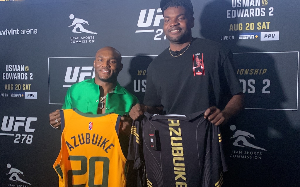 (Eric Walden  |  The Salt Lake Tribune) UFC welterweight champion Kamaru Usman and Utah Jazz center Udoka Azubuike — both native Nigerians — met to exchange jerseys after the UFC 278 news conference at Vivint Arena in Salt Lake City on Aug. 18, 2022.