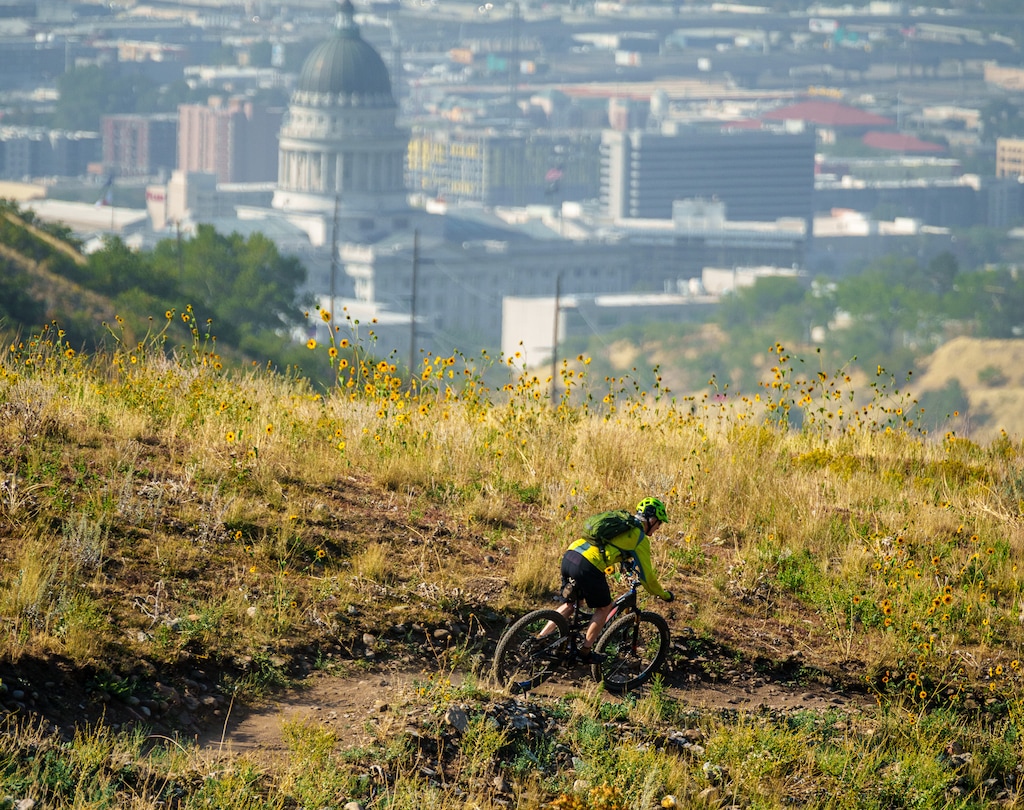 (Trent Nelson  |  The Salt Lake Tribune) A mountain biker rides the 19th Ave trail in the Salt Lake City foothills in September.