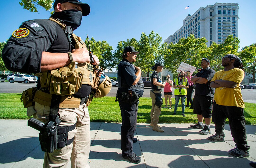 (Rick Egan  |  The Salt Lake Tribune)     Counter protesters show up with Guns and body armor, during a peaceful demonstration at the Salt Lake District Attorney's Office, during a protest to draw attention to Chad Breinholt and Bryan Valencia, who, like Bernardo Palacios were killed by the police, Wednesday, July 8, 2020.