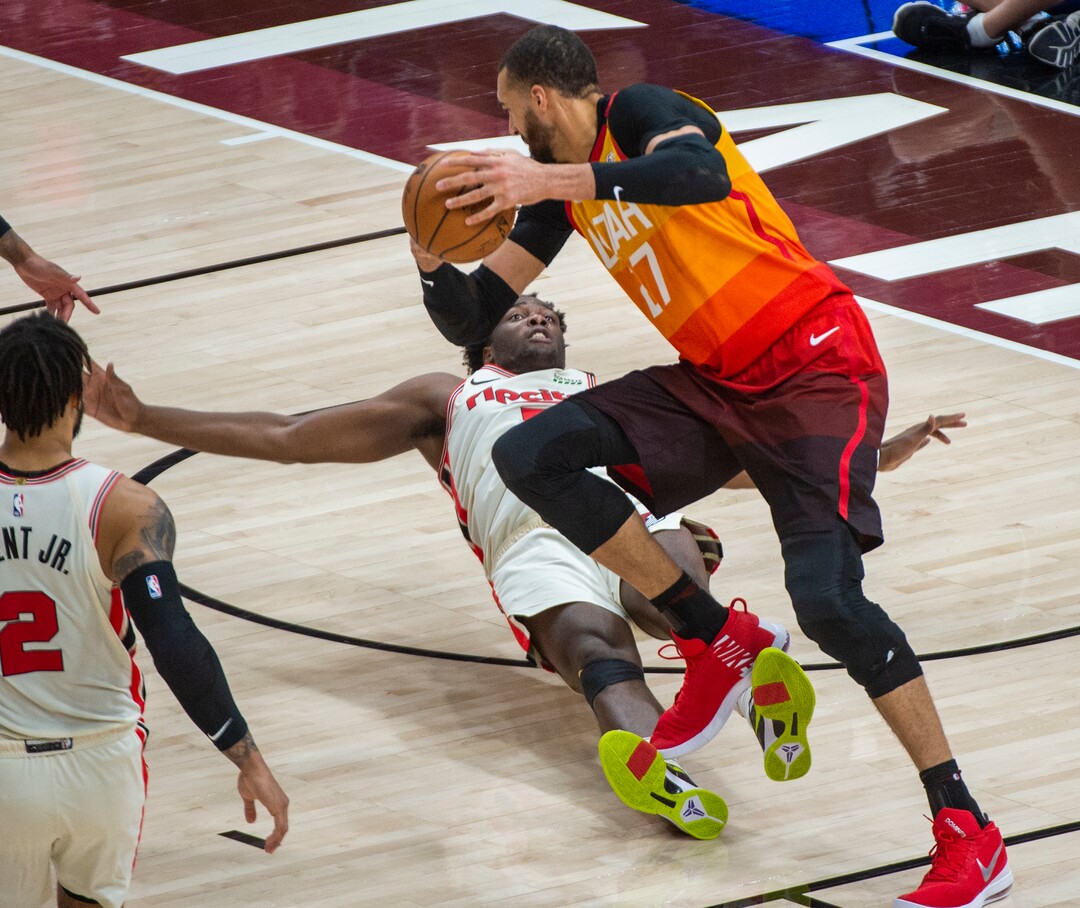 (Rick Egan  |  The Salt Lake Tribune)     Portland Trail Blazers forward Caleb Swanigan (50) draws a foul as he collides with Utah Jazz center Rudy Gobert (27), in the Jazz 117-114 win over the Portland Trail Blazers, in NBA action in Salt Lake City, Friday, Feb. 7, 2020.