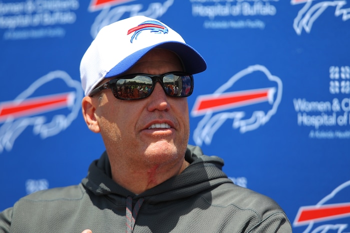 FILE - In this June 16, 2015, file photo, Buffalo Bills head coach Rex Ryan speaks to the media during NFL football minicamp in Orchard Park, N.Y. Rex Ryan already has become an iconic figure in western New York, even though he hasn't coached a scrimmage, let alone a game for the Bills. (AP Photo/Bill Wippert, File)