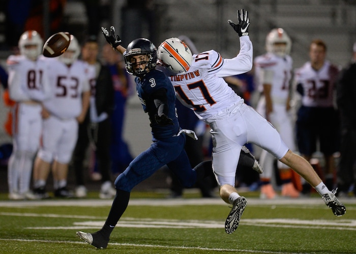 (Francisco Kjolseth  |  The Salt Lake Tribune)  Dalton Hagen of Corner Canyon puts pressure on Hunter Erickson of Timpview to break up a pass in game action at Corner Canyon on Thursday, Sept. 21, 2017.