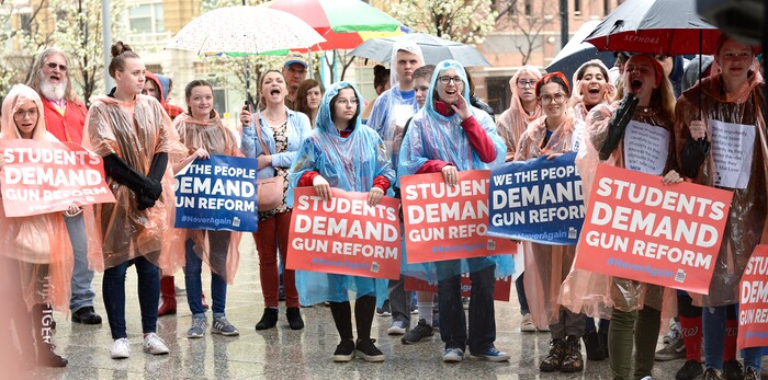 (Leah Hogsten | The Salt Lake Tribune) Demonstrators in support of gun reform at the Wallace F. Bennett Federal Building downtown during the #TownHallForOurLives march, Saturday, April 7, 2018, in response to a national call for town hall meetings issued by David Hogg, one of the leaders of the Parkland FL #NeverAgain movement.