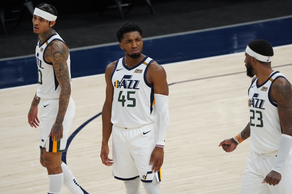 (Leah Hogsten | The Salt Lake Tribune) Utah Jazz guard Donovan Mitchell (45) appears confused by Utah Jazz forward Royce O'Neale (23) as the two and Utah Jazz guard Jordan Clarkson (00) enter the court after a timeout as the Utah Jazz host the Memphis Grizzlies, Mar. 26, 2021 at Vivint Arena.