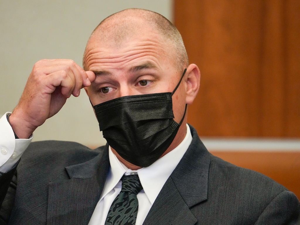(Leah Hogsten | The Salt Lake Tribune) Salt Lake City K-9 police officer Nickolas Pearce appears before Third District Court Judge William K. Kendall, Tuesday, July 26, 2022, during his preliminary hearing on assault charges related to K-9 attacks.