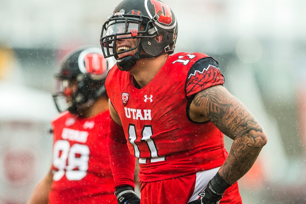 Chris Detrick | The Salt Lake Tribune
Utah Utes defensive end Kylie Fitts (11) laughs after getting a personal foul during the game at Rice-Eccles Stadium Saturday November 28, 2015. Utah is winning the game 10-7 at halftime.