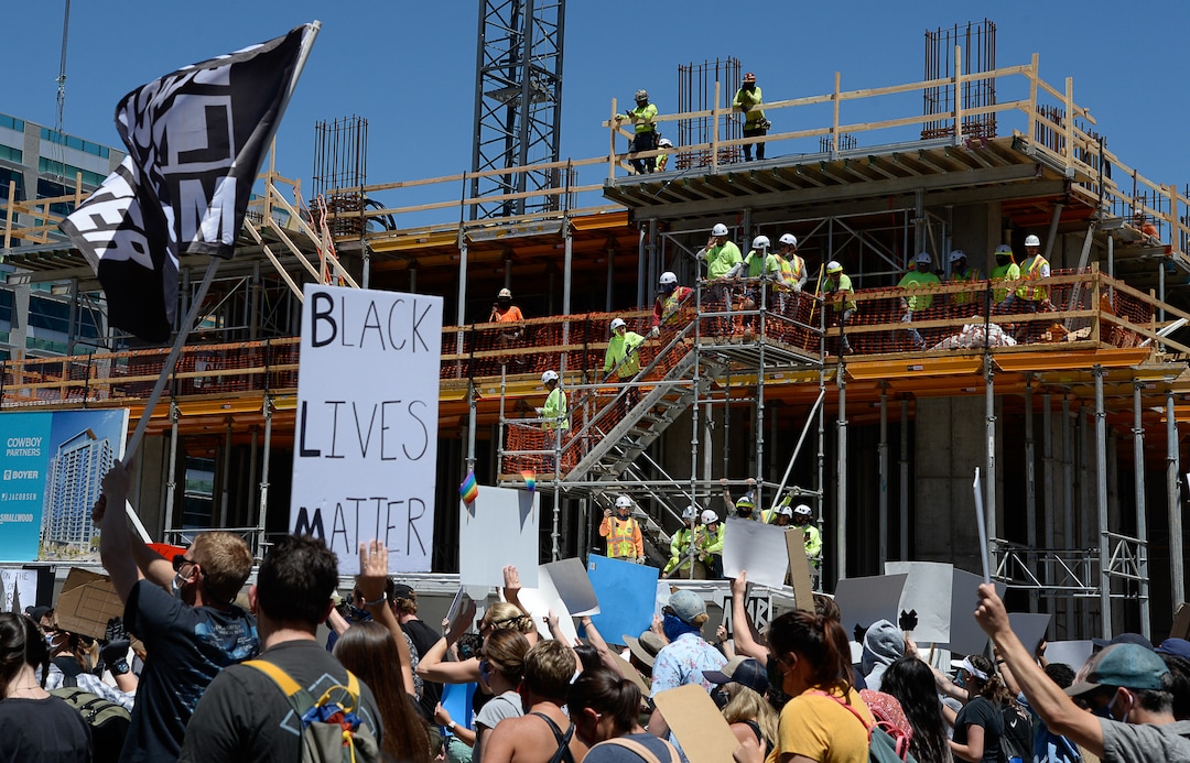 (Francisco Kjolseth  |  The Salt Lake Tribune) Demonstrators march the streets of downtown Salt Lake City for a protest as part of a series of Juneteenth celebrations on Friday, June 19, 2020.