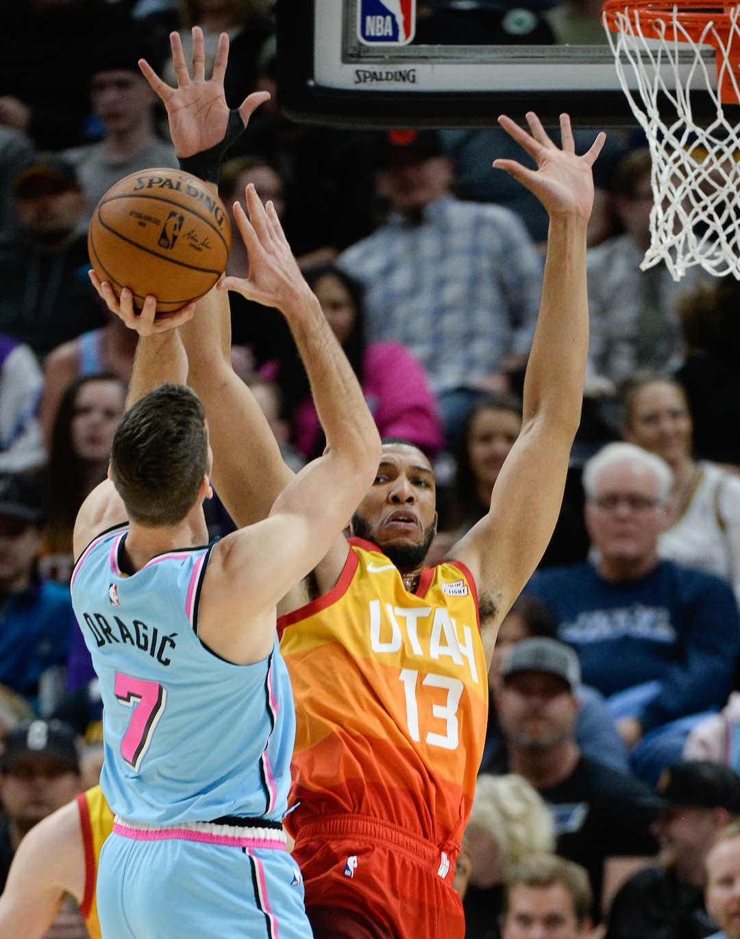 (Francisco Kjolseth  |  The Salt Lake Tribune) Miami Heat guard Goran Dragic (7) goes for the three over Utah Jazz center Tony Bradley (13) as the Utah Jazz host the Miami Heat in their NBA basketball game at Vivint Smart Home Arena in Salt Lake City on Wednesday, Feb. 12, 2020.