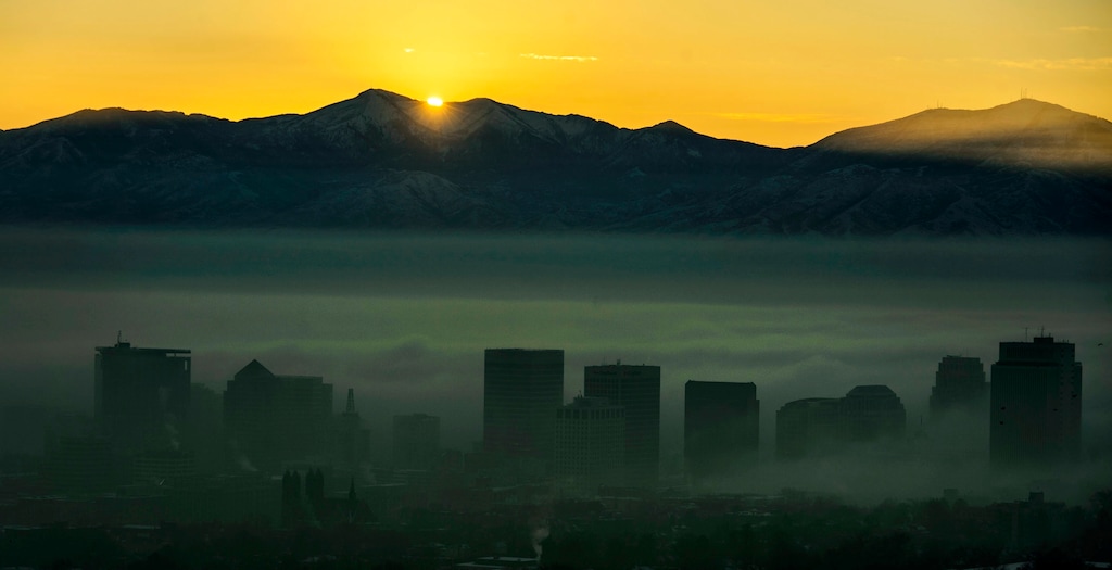 (Steve Griffin | Tribune file photo)  The Salt Lake City skyline is obscured by dense fog as an inversion settles over the valley Tuesday, Dec. 26, 2017.