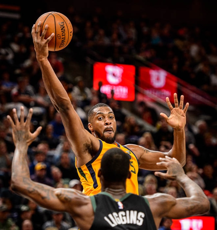 (Trent Nelson | The Salt Lake Tribune)  Utah Jazz forward Derrick Favors (15) reaches for the ball as the Utah Jazz host the Milwaukee Bucks, NBA basketball in Salt Lake City Saturday November 25, 2017.