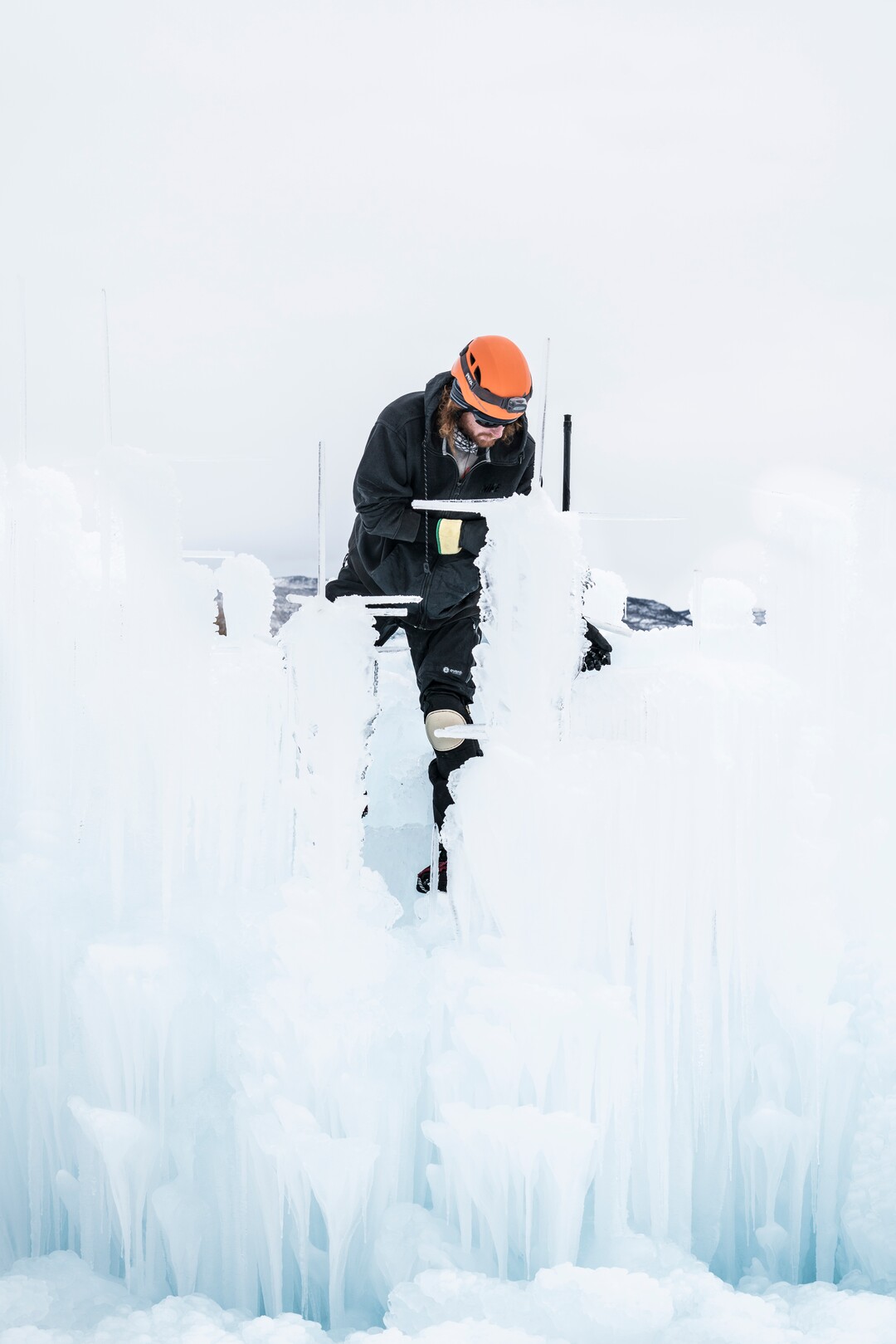 (A.J. Mellor |  courtesy of Ice Castles) An artisan works on the Ice Castles installation in Midway, Utah. The one-acre walk-through ice-and-light show is expected to open to the public in late December.