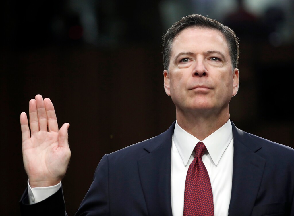 FILE - In this June 8, 2017 file photo, former FBI Director James Comey is sworn in during a Senate Intelligence Committee hearing on Capitol Hill in Washington. On March 13, 2018, ABC announced the former FBI director would appear on "The View" talk show.  (AP Photo/Alex Brandon, File)