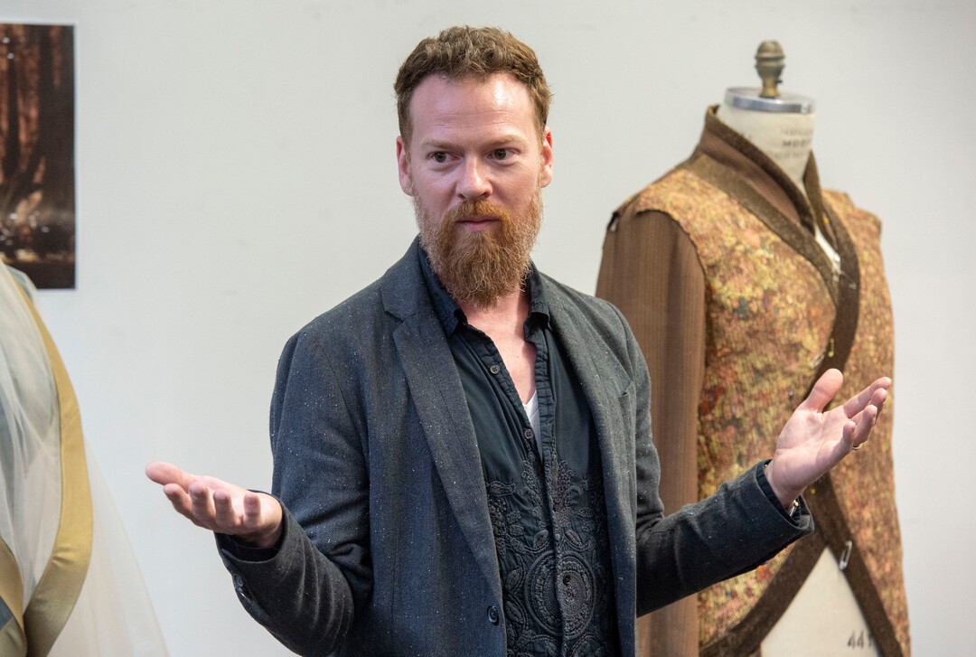 (Rick Egan  |  The Salt Lake Tribune)  "Project Runway" alum Bradon McDonald shows some of his original designs during a preview event for "Norma," at the Utah Opera Production Studios, Monday, April 15, 2019.
