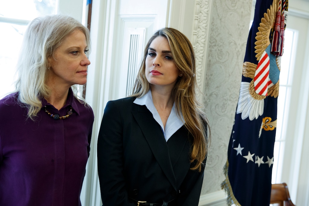White House Communications Director Hope Hicks, right, stands with White House senior adviser Kellyanne Conway during a meeting in the Oval Office between President Donald Trump and Shane Bouvet, Friday, Feb. 9, 2018, in Washington. (AP Photo/Evan Vucci)