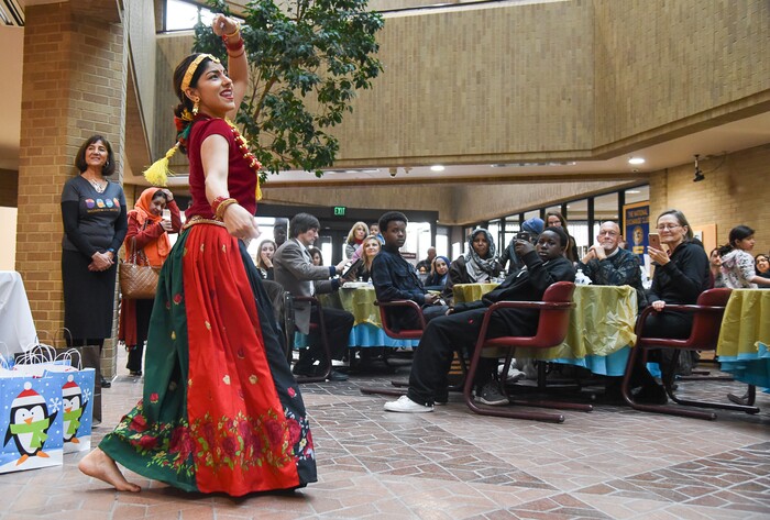 (Francisco Kjolseth  |  The Salt Lake Tribune)  Anju Thapaliya Sharma performs a dance during the Women of the World 8th annual award ceremony at the Salt Lake County building in Salt Lake City on Saturday, Dec. 8, 2018, as a celebration of successes including educational, service, and employment milestones by refugee women.