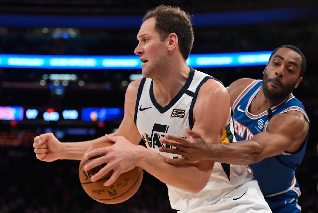Utah Jazz forward Bojan Bogdanovic (44) dribbles the ball as New York Knicks guard Wayne Ellington defends during the second half of an NBA basketball game in New York, Wednesday, March 4, 2020. (AP Photo/Sarah Stier)