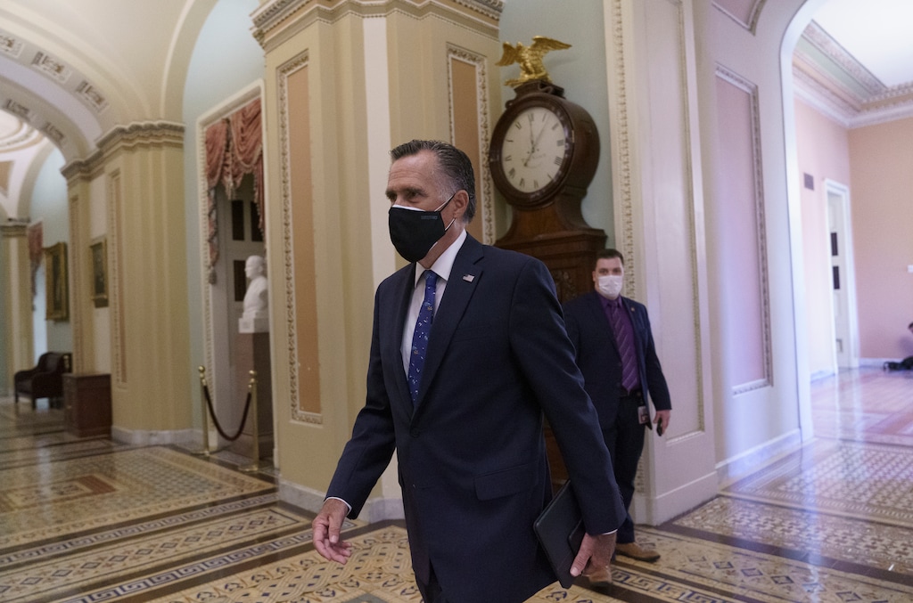 (AP Photo/J. Scott Applewhite) Sen. Mitt Romney, R-Utah, arrives at the Senate chamber on Capitol Hill in Washington, Friday, Oct. 23, 2020.