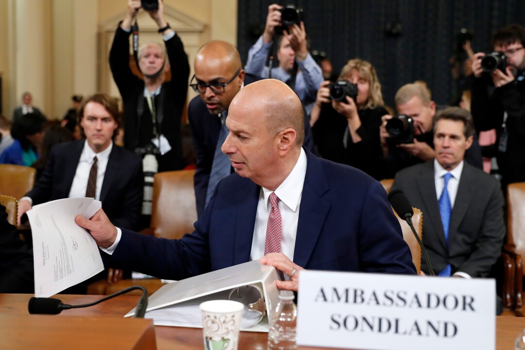 (Andrew Harnik  |  AP photo) U.S. Ambassador to the European Union Gordon Sondland looks over papers during a break as he testifies before the House Intelligence Committee on Capitol Hill in Washington, Wednesday, Nov. 20, 2019, during a public impeachment hearing of President Donald Trump's efforts to tie U.S. aid for Ukraine to investigations of his political opponents. 