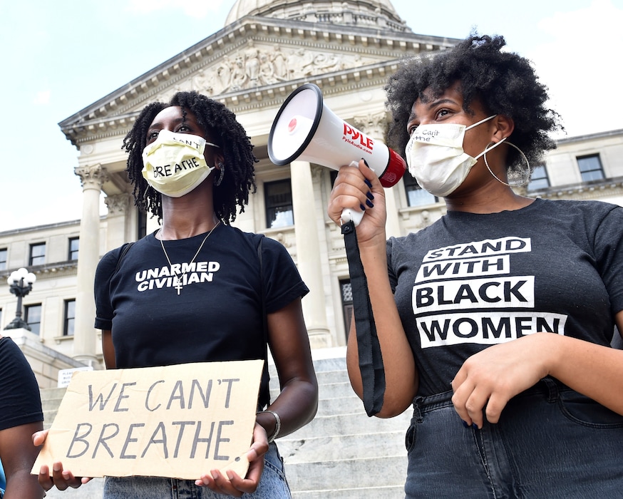 Protesters, who did not wish to be identified, chant outside the Mississippi State Capitol building in Jackson, Miss. on Friday afternoon following comments made by Petal Mayor Hal Marx regarding the death of George Floyd on Monday in Minneapolis. Friday, May 28, 2020. (Sarah Warnock/The Clarion-Ledger via AP)