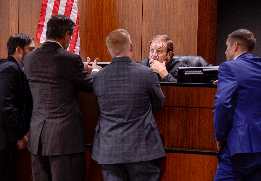 (Leah Hogsten  |  The Salt Lake Tribune)  l-r Defense attorneys and prosecuting attorneys confer with Judge James Brady. Robert Lyman, the man accused of starting the 2017 Brian Head Fire, was bound over for trial and pleaded not guilty to charges of reckless burning and burning during a closed fire season before Judge James Brady in Fourth District Court in Provo, Utah, July 30, 2019.