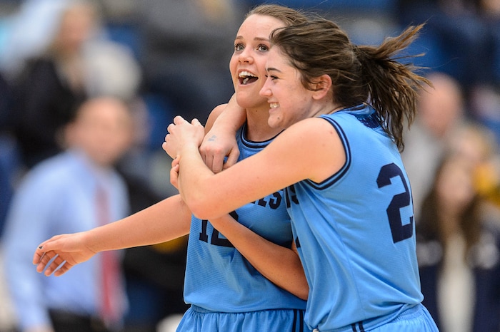 Trent Nelson  |  The Salt Lake TribuneSalem Hills's Lauren Gustin (12) and Salem Hills's JaneAshley Nelson (24) celebrate the win as Skyline faces Salem Hills in a quarterfinals game at the 4A High School Girls Basketball Tournament at Salt Lake Community College in Taylorsville, Wednesday February 24, 2016.