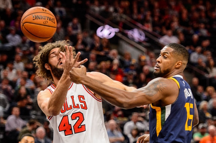 (Trent Nelson | The Salt Lake Tribune)  Chicago Bulls center Robin Lopez (42) and Utah Jazz forward Derrick Favors (15) as the Utah Jazz host the Chicago Bulls, NBA basketball in Salt Lake City Wednesday November 22, 2017.