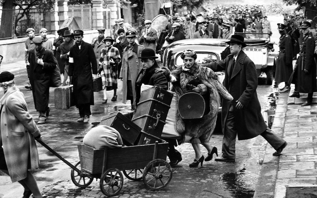 (Universal Studios) A scene from Steven Spielberg's 1993 R-rated epic, "Schindler's List," shows Jews evacuating their homes.