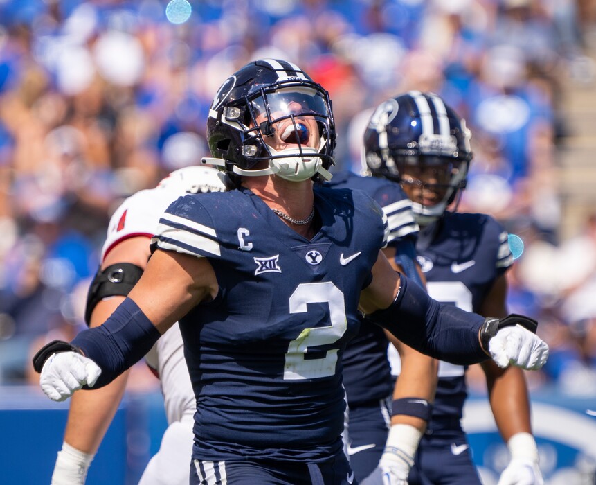 (Rick Egan | The Salt Lake Tribune) Brigham Young Cougars wide receiver Chase Roberts (2) celebrates after scoring a touchdown, against the Southern Utah Thunderbirds and the Brigham Young Cougars, at LaVell Edwards Stadium, on Saturday, Sept. 9, 2023.