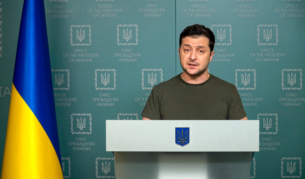 (Ukrainian Presidential Press Office via AP) Ukrainian President Volodymyr Zelenskyy speaks to the nation in Kyiv, Ukraine, Sunday, Feb. 27, 2022. Street fighting broke out in Ukraine's second-largest city Sunday and Russian troops put increasing pressure on strategic ports in the country's south following a wave of attacks on airfields and fuel facilities elsewhere that appeared to mark a new phase of Russia's invasion.